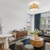 living room seating with dining table and mirror