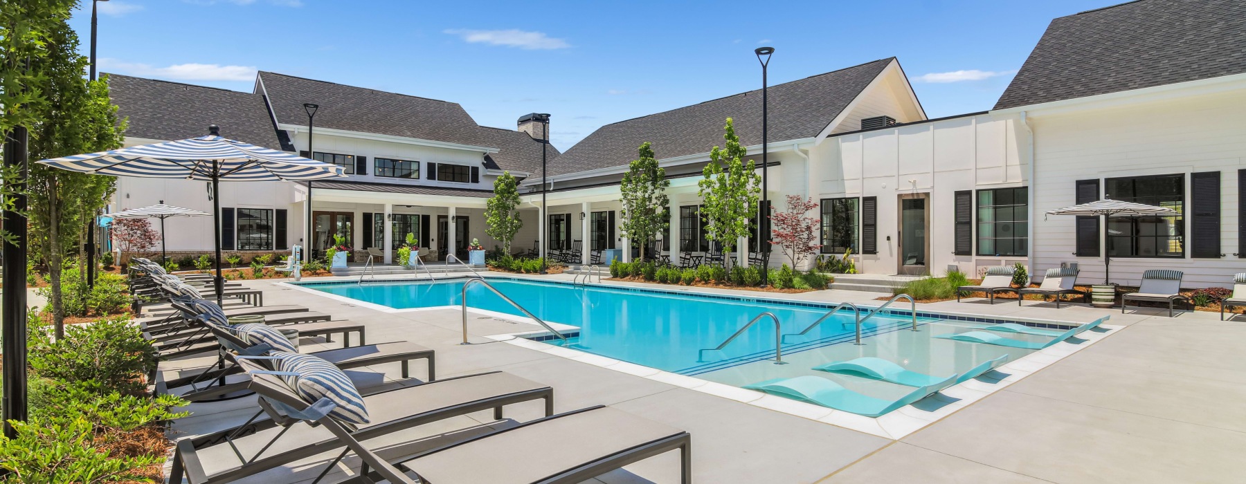 an angle of the pool and clubhouse