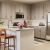 a kitchen with white cabinets